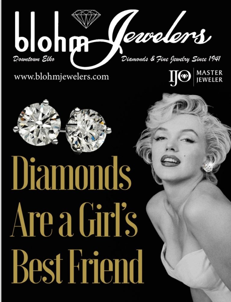 Marilyn Monroe poses elegantly, showcasing diamond earrings.